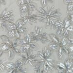 Light Silver tulle fabric adorned with floral embroidery