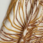 Golden Tulle with shiny, floral embroidery