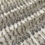 Silver Tulle fabric with shiny, striped embroidery