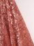 Red Tulle adorned with embroidery