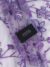 Mauve tulle fabric featuring floral embroidery