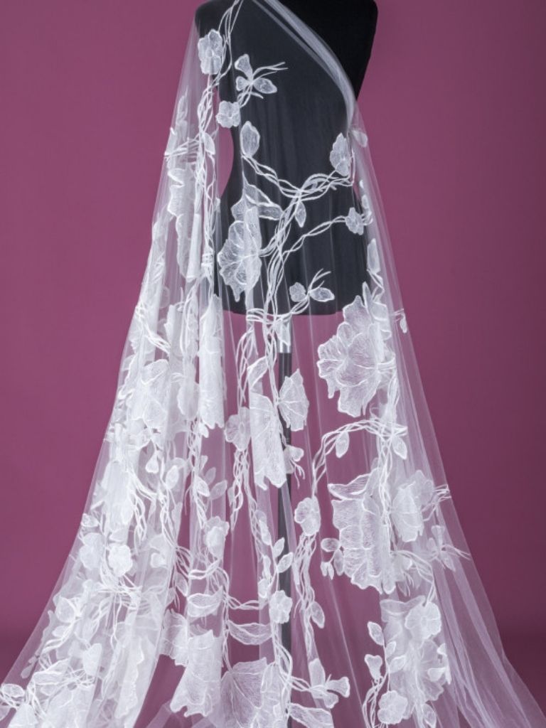 22-3280.01 off white tulle with embroidered flowers - Image 1