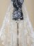 Off White Tulle adorned with floral emroidery