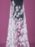 Ebony off white tulle adorned with elegant floral embroidery