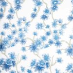 Ebony Elegant Tulle adorned with Light blue floral embroidery
