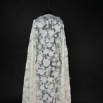 Off White Tulle with intricate embroidery and sequins