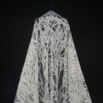 offwhite Tulle fabric with double cord embroidery and subtle sequins