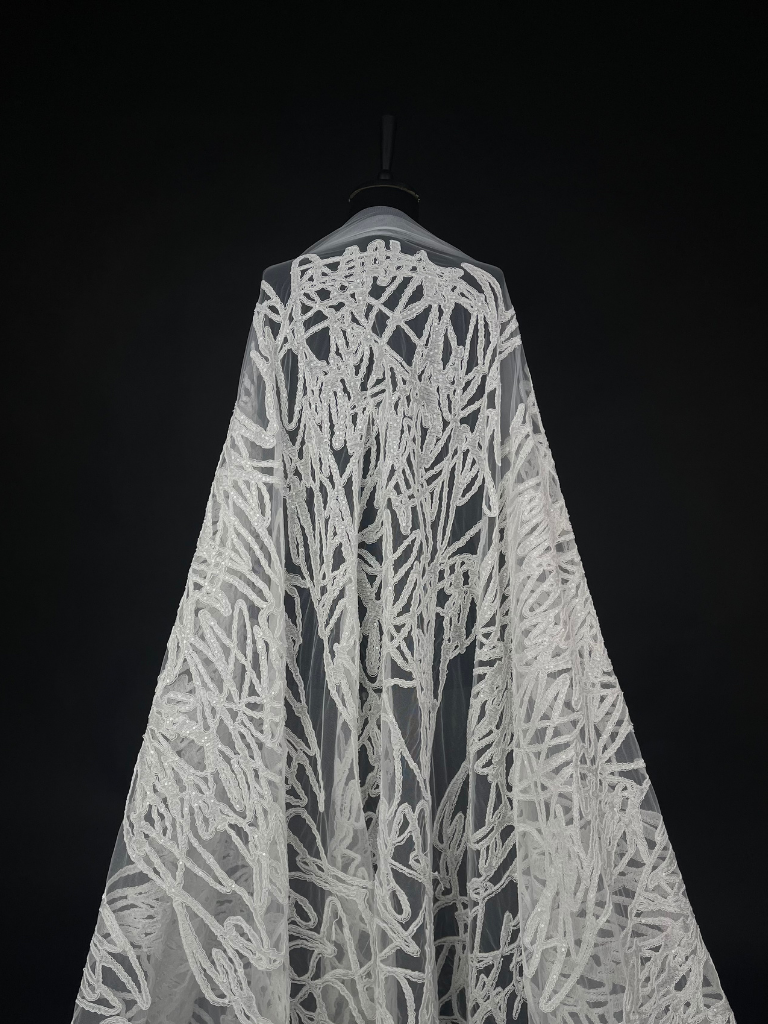 23-3444_01 offwhite Tulle fabric with double cord embroidery and subtle sequins - Image 1