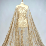 Golden Tulle fabric with double cord embroidery and subtle sequins