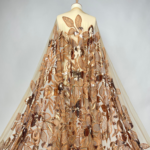Tulle with floral embroidery, subtle sequins, and beads