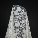 Off White Tulle with vibrant floral embroidery and sequins for a dazzling touch