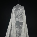 Off White tulle with large, flowy embroidered flowers