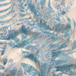 Baby blue Tulle with sequined leaf patterns for a touch of sparkle and elegance