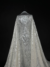 Off White Tulle fabric with round sequins for a sparkling, elegant touch