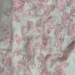 Pink Tulle fabric with round sequins for a sparkling, elegant touch