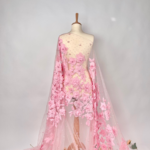 Tulle with appliquéd flowers and pink pearl centers for a touch of elegance