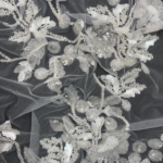 Off White Tulle with sequin patterns and embroidery for a touch of elegant sparkle