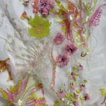 Pink and yellow Tulle with geometric embroidery and subtle sequins