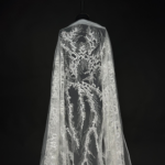 Off White Tulle with geometric embroidery, sequins, and beads