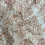 Brown Lace fabric with intricate embroidery and subtle sequins for a refined, elegant touch