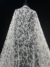 Off White Tulle with sequins in a patterned design