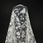 Tulle with intricate embroidery and shimmering sequins
