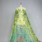 Tulle with embroidered flowers and subtle sequins