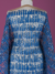 Tulle with shiny, blue and striped embroidery