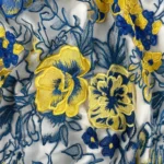 Transparent Tulle with bright yellow and blue Floral Embroidery