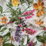 Transparent Tulle with yellow, purple and pink floral Embroidery