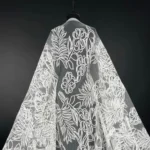 Off White Harmony Tulle adorned with floral embroidery
