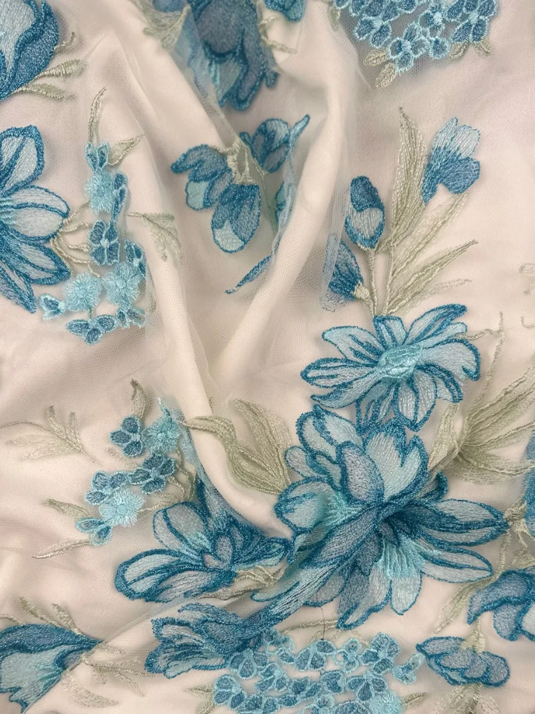 23-3469000 Baby blue Harmony Tulle adorned with floral embroidery - Image 1