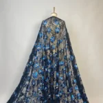 Glamorous black lace with bold blue sequin flowers