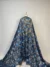 Glamorous black lace with bold blue sequin flowers