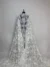 Glamorous off white lace with bold sequin flowers
