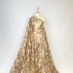 Elegant nude tulle with a sparkling sequin leaf pattern