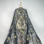 Floral Elegance in both lace and tulle, featuring intricate all-over black floral embroidery.