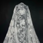 Off White Floral Elegance in both lace and tulle, featuring intricate all-over floral embroidery.