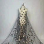Sheer tulle with jacquard appliqué and subtle sequin sparkle