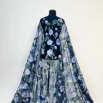 Enchanting tulle with intricate blue floral embroidery