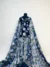 Enchanting tulle with intricate blue floral embroidery