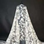Enchanting tulle with intricate off white floral embroidery