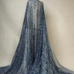 Glamorous blue tulle with shimmering leaf-patterned sequins and beads