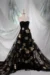 Black tulle with delicate embroidery, subtle sequins, and 3D jacquard golden flowers with sequin accents.