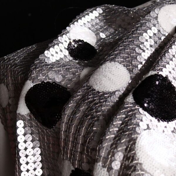 Black and White circles sequins on a silver tulle