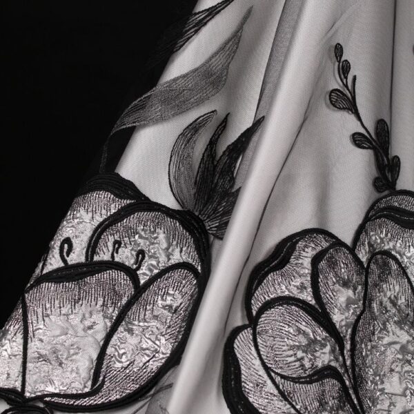 Black and Grey tulle adorned with floral embroidery