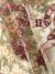 Light beige and burgundy coloured Tulle fabric adorned with floral embroidery