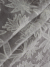 white tulle adorned with floral embroidery - Image 2