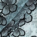 Black Tulle adorned with stunning floral embroidery