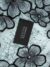 Black Tulle adorned with stunning floral embroidery - Image 4